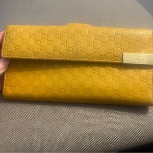 Gucci authentic yellow leather wallet